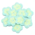 Close-up of light blue and yellow embroidered plum blossom patches for DIY crafts and clothing. - 10 Pieces/Pack / Green