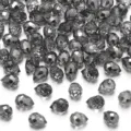 Detailopname van gefacetteerde grijze kristalglasralen, glanzende druppelbedels voor sieraden. - Gefacetteerde Aardbei (Horizontaal Gat) / Ca. 6x8mm (30 Stuks/Verpakking) / Transparant Grijs