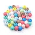 Bunte Holzperlen DIY Materialpackung für handgemachte Armbänder und Halsketten Schmuckdesign. - 6mm Außendurchmesser, 2mm Loch, 100 Stück/Packung / Macaron-Mischfarben Zufällig