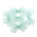 Close-up detail of light green organza sheer bowknot DIY accessories for crafts and apparel. - Large Bow Accessory (F6292) / Green