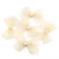 Close-up detail of sheer organza fabric bow decoration, elegant texture and delicate design. - Large Bow Accessory (F6292) / Yellow