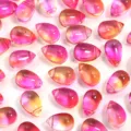 Close-up of pink orange gradient teardrop glass beads for DIY jewelry and crafts making. - 50 Pieces/Pack (9x6mm) / Rose Red with Orange Water Drop
