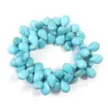 Turquoise melon seed beads detail view, ideal for DIY ethnic jewelry making accessories. - Horizontal Hole Flat Melon Seed Style / 12x8mm (Approx. 70 Pcs) / Blue