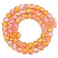 Nahaufnahme einer Strähne aus elektroplantierten, schimmernden Quadrat-Glasperlen für DIY-Schmuck. - Unregelmäßig / 12x11mm (55 Stück/Packung) / Orange AB