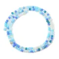 Close-up detail of mixed blue faceted crystal glass spacer beads for DIY jewelry making. - 145 Pieces/Pack / Aqua Blue / 3mm