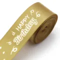 Gold satin ribbon close-up with white happy birthday print, ideal for gift wrapping and parties. - Gold (F6406) / Width 2.5cm 5 Yards/Roll / Gold