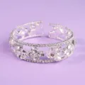 Silver tone rhinestone cuff bracelet with sparkling crystal clover motifs for women and girls. - Premium Luxury Bangle BS-J5462S
