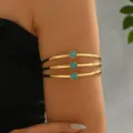 Elegante bracciale da polso o braccio dorato multistrato con pietre turchesi moda. - Oro