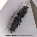 Barrette à cheveux noire en strass avec un magnifique design de feuille pour femmes. - Style Oeil de Cheval Ondulé (HS-J7491BLK) / Noir