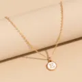 Gold chain necklace with a white round pendant featuring letter E design daily wear jewelry. - Letter E