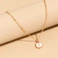 Minimalist gold chain necklace with a white enamel round letter I pendant for women fashion. - Letter I