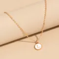 Minimalist long gold chain necklace with white enamel letter L pendant for women fashion. - Letter L