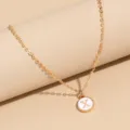 Gold-plated chain necklace featuring a chic white enamel round letter X pendant jewelry. - Letter X