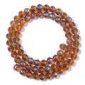 Close-up van gefacetteerde kristallen glasparels met AB coating voor DIY sieraden. - Middelgroot Amber