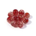 Gros plan de perles en verre rouge avec des paillettes dorées pour création de bijoux. - Diamètre env. 8mm (10 Pcs/Paquet) / Rouge