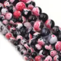 Dettaglio ravvicinato di perline di agata fiamma bicolore naturale per accessori di gioielli fai da te. - Diametro 6mm, Foro 0,8mm (circa 60 perle) / Motivo a fiamma rossa