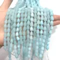 Gros plan de perles en pierres précieuses bleu clair en forme de goutte pour bijoux DIY. - 8*10mm (Environ 40 Pièces) / Ovale Bleu Clair