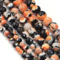 Primo piano di perline in agata fiamma arancione e nera, pietra liscia per gioielli fai da te. - Diametro 6mm Dimensione del Foro Circa 0.8mm (Circa 60 Perline) / Fiamma Arancione