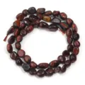 Hilo de cuentas ovaladas irregulares de piedra roja natural para fabricar joyas de bricolaje. - Diámetro Aprox. 5-10mm Agujero Aprox. 0,8mm / Aprox. 45 Piezas/Paquete / Ojo de Tigre Rojo Irregular