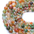 Close-up detail van kleurrijke agaat kralen, glad gepolijst voor DIY sieraden maken. - 4mm Streng