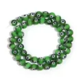 Green evil eye glass beads detail shot, perfect for DIY handmade bracelets and necklaces accessories. - Diameter 4mm Hole 0.8mm (Approx 90 Pcs) / Green