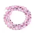 Detailed close-up of pink glass evil eye beads strand, perfect for DIY jewelry making and crafts. - 4mm Diameter, 0.8mm Hole (Approx. 90 Pcs) / Pink Evil Eye Round Beads