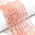 Primo piano di perline di cristallo sfaccettate rosa chiaro, perfette per gioielli. - 100 Pezzi (3x2mm) / Rosa Chiaro AB