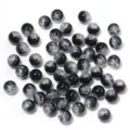 Closeup of black and silver crackle glass beads detail for DIY jewelry making crafts. - 8mm (50pcs/Pack) / Black and White