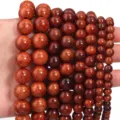 Detailansicht polierter Holzperlen, ideal für DIY-Schmuckherstellung und Armbänder. - 6mm (Ungefähr 64 Stück) / Birma-Birnenholz-Farbe