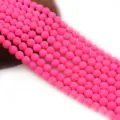 Hot pink lava rock stone beads strand for handmade DIY jewelry making and bracelets detail view - Fluorescent Red