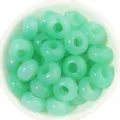 Light green crystal glass round flat spacer beads for DIY handmade bracelets, necklaces, and jewelry. - 50 Pieces / Green Gradient