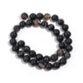Detail shot of natural black striped agate round beads strand for DIY jewelry making accessories. - Black Striped Agate / 10mm (Approx 35pcs)