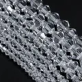 Close-up detail of clear faceted crystal loose beads strung neatly for DIY jewelry. - Bicone Bead / 8mm (Approx. 38 Pcs/Strand) / Clear