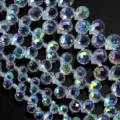 Detailed view of AB coated faceted teardrop crystal beads for DIY jewelry making and craft accessories. - 6mm Outer Diameter (Approx. 85 Pieces/Strand) / Transparent New AB Strawberry Crystal Bead