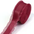 Close-up detail of dark red ruffled ribbon edge, showing fine polyester texture and delicate pleats. - Ruffle Edge Ribbon / 2.5CM Wide / Burgundy