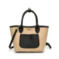Woven straw bucket handbag with black PU leather trim, top handle and crossbody strap stylish. - Black
