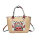 Chic straw woven bucket bag featuring artistic opera mask print, versatile shoulder and crossbody. - Facial Mask Color 2