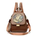Stylish brown leather textured backpack with elephant embossed design, versatile travel bag. - Elephant / Yellow