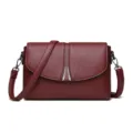 Wine red leather shoulder bag for women, elegant simple crossbody bag with metallic clasp detail. - Red