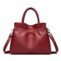 Red leather drawstring bucket bag, elegant top handle shoulder crossbody bag for women daily commute. - Red