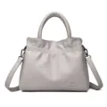 Grey leather shoulder bag, stylish drawstring tote with handle and crossbody strap. - Light Gray