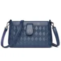 Stylish women's blue PU leather quilted crossbody shoulder bag with elegant clasp and strap. - Blue
