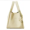 Beige leather tote bag for women, stylish bucket handbag with double handles and cute clover charm. - With Pendant / Chick Yellow
