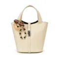 Chic beige leather bucket bag for women, featuring cute plush bear pendant and top handle. - With Pendant / Off White