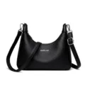 Classic black shoulder bag for women, stylish hobo bag with adjustable strap and chic metal accent. - Black