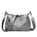 Grijze lederen schoudertas voor dames, multi-pocket crossbody tas met verstelbare schouderriem. - Grijs