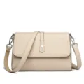 Beige leather crossbody bag, small square shoulder bag with metal heart clasp variant. - Apricot