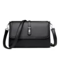 Elegant black leather shoulder bag, chic designer crossbody purse for women and daily use. - Black
