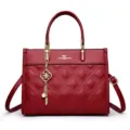 Elegant red quilted leather tote bag for women, large capacity shoulder handbag with charm. - Burgundy