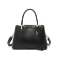 Stylish black leather shoulder bag featuring structured panels, gold hardware, and fashion charm. - Black